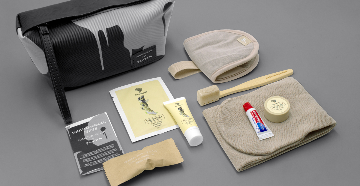 Sustainable business class elements including compostable packaging and eco-friendly seat materials