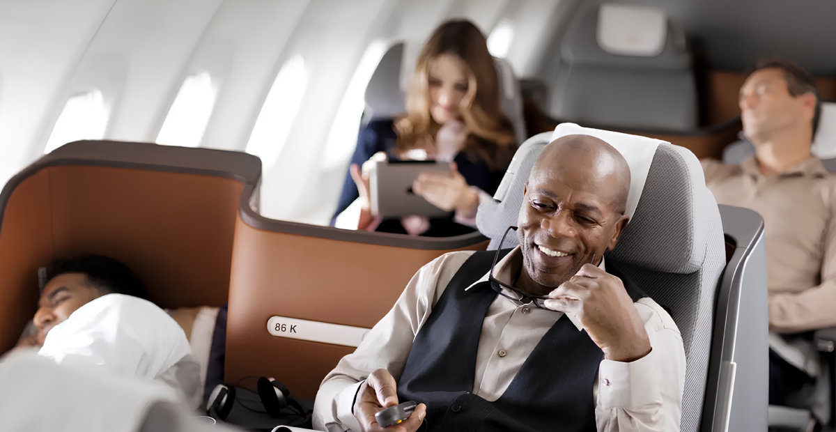 Panoramic view of a modern business class cabin showing comfort, privacy, and sophisticated design